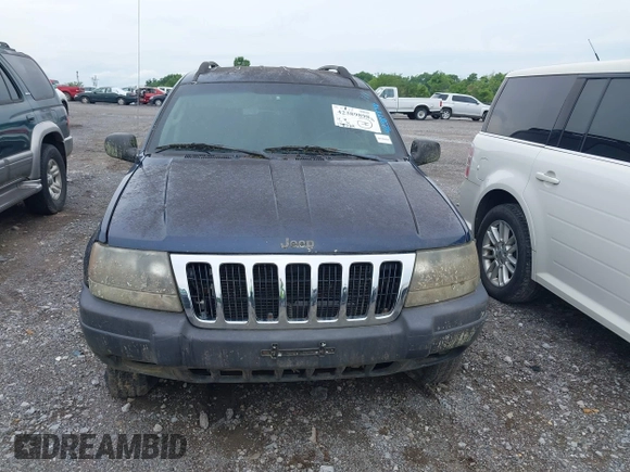 2003 Jeep Grand Cherokee Laredo with VIN 1J4GW48S63C591605, listed as a IAAI auction lot 42389898 with 177,024 mi miles and . Bid and sale history available at DreamBid. Image 6.