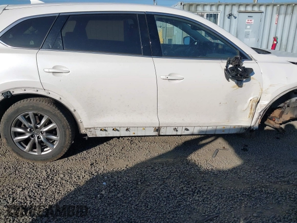 2018 Mazda CX-9 Touring z VIN JM3TCBCY3J0223076, wystawiony jako IAAI lot #42099819 z przebiegiem 160 097 mil mil oraz . Historia ofert i sprzedaży dostępna na DreamBid. Obrazek 6.
