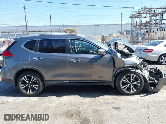 2017 Nissan Rogue S with VIN JN8AT2MV9HW263307, listed as a IAAI auction lot 42317181 with 114,445 mi miles and . Bid and sale history available at DreamBid. Image 13.