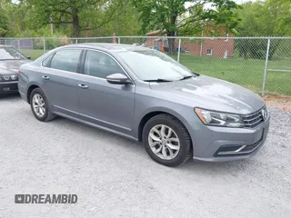 2016 Volkswagen Passat 1.8T S with VIN 1VWAT7A39GC032948, listed as a IAAI auction lot 42127599 with 177,407 mi miles. Bid and sale history available at carsss.com. Image 1.
