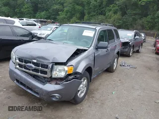 2008 Ford Escape XLT with VIN 1FMCU93108KE75766, listed as a IAAI auction lot 42595254 with 165,436 mi miles and . Bid and sale history available at DreamBid. Image 2.