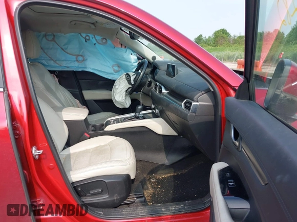 2018 Mazda CX-5 Grand Touring with VIN JM3KFBDM2J0448555, listed as a IAAI auction lot 42449282 with 65,770 mi miles and . Bid and sale history available at DreamBid. Image 5.