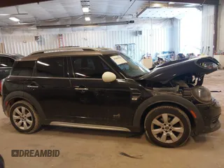 2019 MINI Countryman Cooper with VIN WMZYV5C53K3E05041, listed as a IAAI auction lot 41684566 with 65,237 mi miles. Bid and sale history available at carsss.com. Image 13.