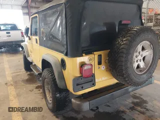 2005 Jeep Wrangler Unlimited with VIN 1J4FA44S95P373346, listed as a IAAI auction lot 41707821 with 175,865 mi miles. Bid and sale history available at carsss.com. Image 3.