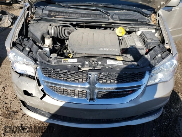 2016 Dodge Grand Caravan SXT with VIN 2C4RDGCG5GR219517, listed as a Copart auction lot 50052405 with 104,552 mi miles and Salvage Title. Bid and sale history available at DreamBid. Image 12.