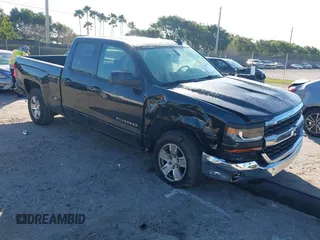 2016 Chevrolet Silverado 1500 LT with VIN 1GCVKREC8GZ390035, listed as a IAAI auction lot 41466694 with 150,727 mi miles. Bid and sale history available at carsss.com. Image 1.