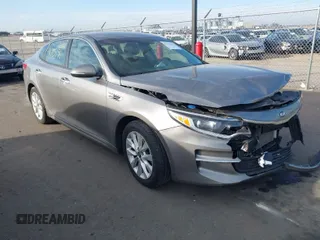 2018 Kia Optima LX with VIN 5XXGT4L33JG264459, listed as a IAAI auction lot 41793396 with 62,450 mi miles. Bid and sale history available at carsss.com. Image 1.