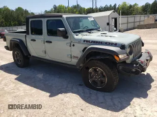 2023 Jeep Gladiator Rubicon с VIN 1C6JJTBG2PL542178, выставлен на аукционе Copart как лот 54684915 с пробегом 24 687 миль миль и Списание • Salvage title. История ставок и продаж доступна на DreamBid. Изображение 4.