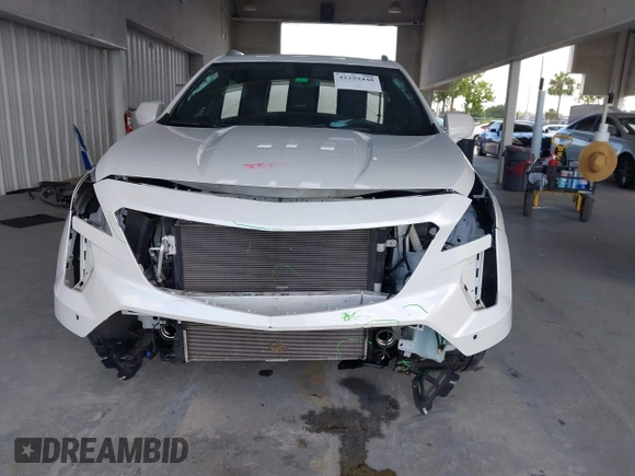 2019 Cadillac XT4 FWD Premium Luxury z VIN 1GYFZCR49KF142039, wystawiony jako IAAI lot #42259448 z przebiegiem 47 620 mil mil oraz . Historia ofert i sprzedaży dostępna na DreamBid. Obrazek 13.