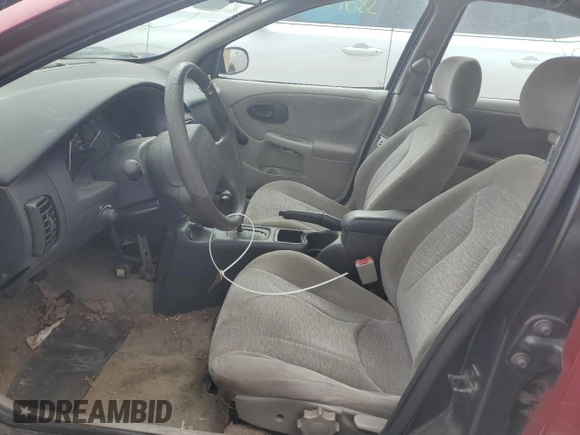 2000 Saturn SL with VIN 1G8ZK5276YZ255844, listed as a Copart auction lot 42003175 with 239,377 mi miles and Salvage title. Bid and sale history available at DreamBid. Image 7.