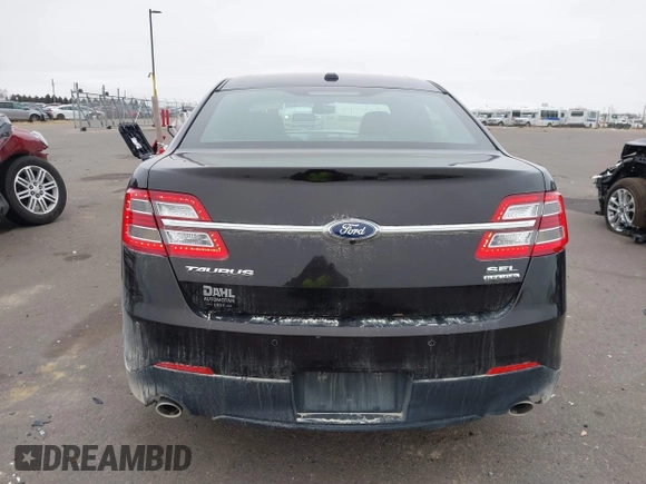 2014 Ford Taurus SEL z VIN 1FAHP2E85EG121636, wystawiony jako IAAI lot #41036886 z przebiegiem 117 460 mil mil oraz . Historia ofert i sprzedaży dostępna na DreamBid. Obrazek 16.
