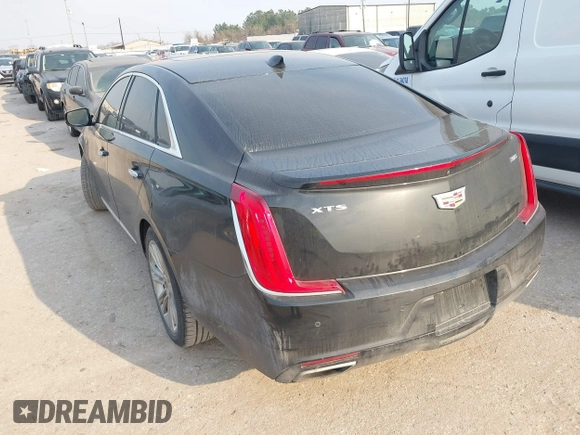 2019 Cadillac XTS Luxury with VIN 2G61M5S38K9100792, listed as a IAAI auction lot 41676187 with 103,056 mi miles and . Bid and sale history available at DreamBid. Image 3.
