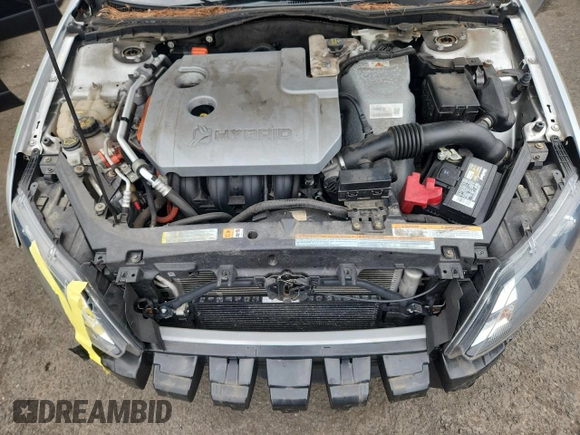 2012 Ford Fusion Hybrid z VIN 3FADP0L34CR227740, wystawiony jako Copart lot #64989475 z przebiegiem 134 862 mil mil oraz Szkoda całkowita • Salvage title. Historia ofert i sprzedaży dostępna na DreamBid. Obrazek 11.