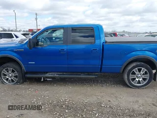 2014 Ford F-150 XL with VIN 1FTFW1ET0EKF39280, listed as a IAAI auction lot 42038842 with 209,864 mi miles and . Bid and sale history available at DreamBid. Image 14.