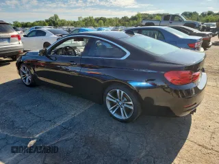 2016 BMW 4 Series 428i xDrive with VIN WBA3N9C52GK249387, listed as a Copart auction lot 65697805 with 203,385 mi miles and Clean title. Bid and sale history available at DreamBid. Image 2.