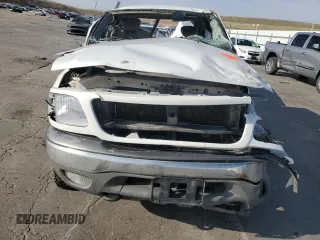 2002 Ford F-150 XL with VIN 1FTRX18L12NA01509, listed as a Copart auction lot 51098435 with Not provided miles and Salvage title. Bid and sale history available at DreamBid. Image 5.
