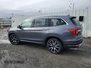 2020 Honda Pilot Touring 7-Passenger with VIN 5FNYF6H60LB039609, listed as a Copart auction lot 51753425 with 57,512 mi miles and Salvage title. Bid and sale history available at DreamBid. Image 2.