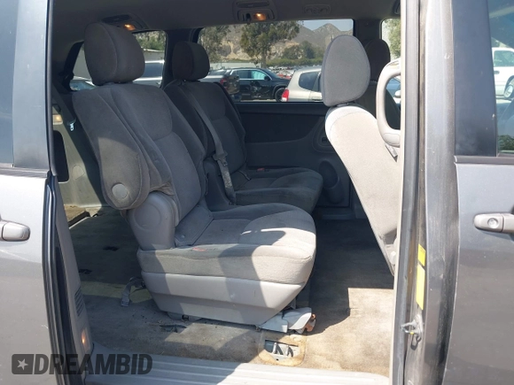 2005 Toyota Sienna CE with VIN 5TDZA23C75S342958, listed as a IAAI auction lot 42120039 with 211,029 mi miles. Bid and sale history available at carsss.com. Image 8.