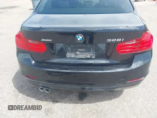 2014 BMW 3 Series 328i xDrive with VIN WBA3B3C56EJ981322, listed as a IAAI auction lot 42104530 with 104,376 mi miles. Bid and sale history available at carsss.com. Image 6.