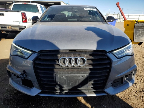 2018 Audi A6 Sport z VIN WAUF3AFC7JN079323, wystawiony jako Copart lot #50827405 z przebiegiem 75 554 mil mil oraz Szkoda całkowita • Salvage title. Historia ofert i sprzedaży dostępna na DreamBid. Obrazek 5.