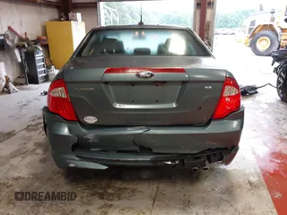 2012 Ford Fusion SE z VIN 3FAHP0HA8CR298495, wystawiony jako IAAI lot #42245859 z przebiegiem 192 979 mil mil oraz . Historia ofert i sprzedaży dostępna na DreamBid. Obrazek 16.