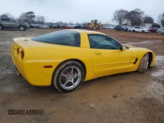 2004 Chevrolet Corvette with VIN 1G1YY22G645102213, listed as a Copart auction lot 84958784 with 77,338 mi miles and Salvage Title. Bid and sale history available at carsss.com. Image 3.