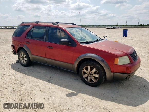 2005 Ford Freestyle SE with VIN 1FMZK01105GA54885, listed as a Copart auction lot 58414145 with 306,275 mi miles and Salvage title. Bid and sale history available at DreamBid. Image 4.