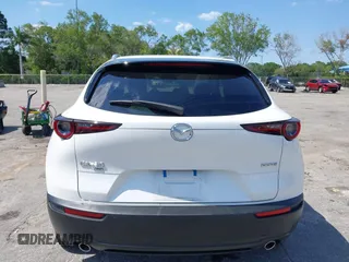 2024 Mazda CX-30 S Carbon Edition with VIN 3MVDMBCM2RM719131, listed as a IAAI auction lot 42265739 with 8,470 mi miles and . Bid and sale history available at DreamBid. Image 17.