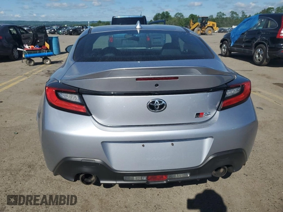 2023 Toyota GR86 Premium with VIN JF1ZNBE18P9763627, listed as a Copart auction lot 56766164 with 9,465 mi miles and Salvage Title. Bid and sale history available at carsss.com. Image 6.