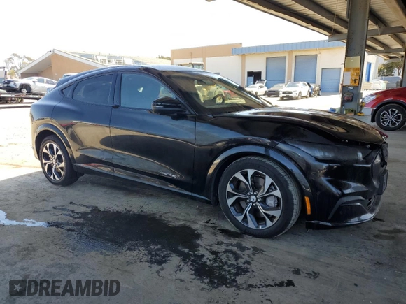 2023 Ford Mustang Mach-E Premium with VIN 3FMTK3SUXPMA96957, listed as a Copart auction lot 52404535 with Not Provided miles and Non Repairable. Bid and sale history available at DreamBid. Image 4.