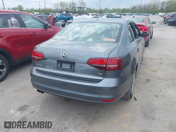 2017 Volkswagen Jetta S with VIN 3VW2B7AJ1HM253059, listed as a IAAI auction lot 42171533 with Not provided miles and . Bid and sale history available at DreamBid. Image 4.