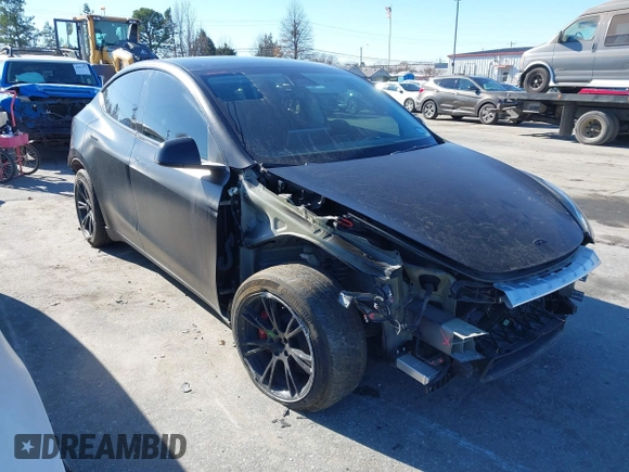 2022 Tesla Model Y Long Range with VIN 7SAYGDEEXNF424856, listed as a IAAI auction lot 41059718 with 44,439 mi miles and . Bid and sale history available at carsss.com. Image 1.