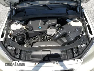 2014 BMW X1 xDrive28i z VIN WBAVL1C57EVY10873, wystawiony jako Copart lot #57914375 z przebiegiem 114 153 mil mil oraz Szkody całkowita. Historia ofert i sprzedaży dostępna na DreamBid. Obrazek 11.