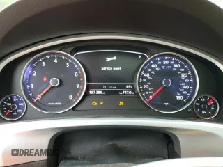 2013 Volkswagen Touareg Exec с VIN WVGEF9BP4DD007109, выставлен на аукционе Copart как лот 58890665 с пробегом 157 286 миль миль и Списание • Salvage title. История ставок и продаж доступна на DreamBid. Изображение 9.