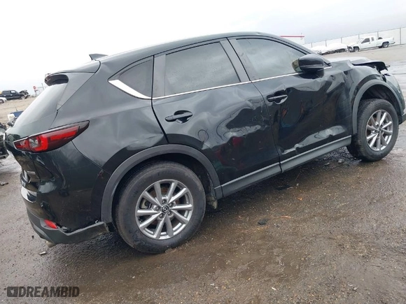 2022 Mazda CX-5 2.5 S Carbon Edition with VIN JM3KFBCM9N0579750, listed as a IAAI auction lot 41553088 with NaN miles. Bid and sale history available at carsss.com. Image 4.