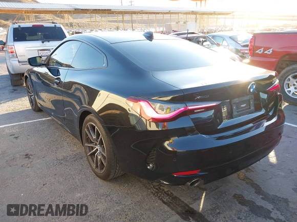 2022 BMW 4 Series 430i xDrive with VIN WBA73AP00NCJ16822, listed as a IAAI auction lot 41329235 with 30,570 mi miles and . Bid and sale history available at DreamBid. Image 14.