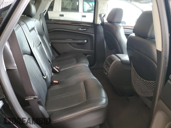 2015 Cadillac SRX Performance Collection with VIN 3GYFNCE34FS631491, listed as a Copart auction lot 64109575 with 102,763 mi miles and Salvage title. Bid and sale history available at DreamBid. Image 11.