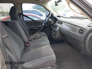 2007 Chevrolet Tahoe LS with VIN 1GNFC13C57R401893, listed as a IAAI auction lot 42046960 with 258,231 mi miles and . Bid and sale history available at DreamBid. Image 5.