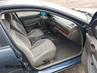 2002 Chrysler Sebring LX with VIN 1C3EL46R32N200973, listed as a IAAI auction lot 41709269 with 56,592 mi miles and . Bid and sale history available at DreamBid. Image 5.