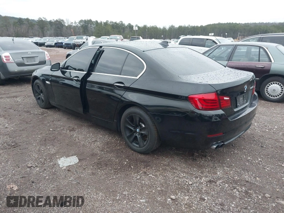 2013 BMW 5 Series 528i with VIN WBAXG5C54DD231297, listed as a IAAI auction lot 41209069 with 79,878 mi miles and . Bid and sale history available at carsss.com. Image 3.
