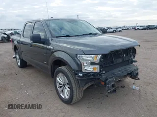 2015 Ford F-150 XLT with VIN 1FTEW1EGXFFA08354, listed as a IAAI auction lot 41627569 with 125,940 mi miles and . Bid and sale history available at DreamBid. Image 1.