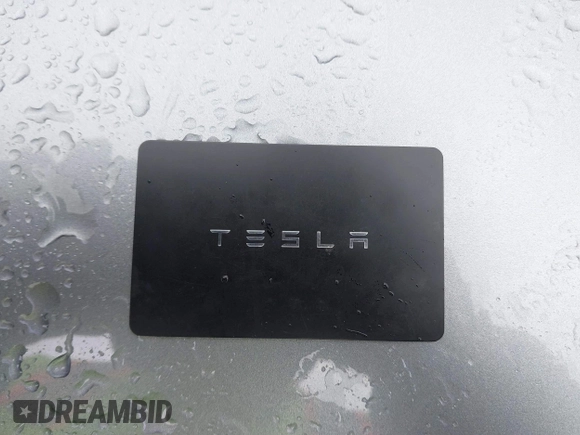 2025 Tesla Model Y Long Range with VIN 7SAYGDEDXSF248734, listed as a IAAI auction lot 41719195 with 5,876 mi miles and . Bid and sale history available at DreamBid. Image 11.