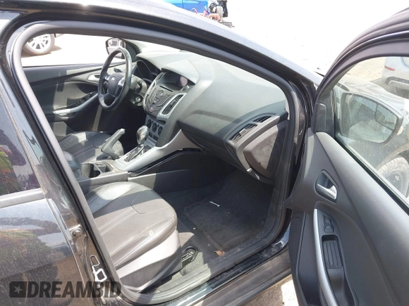2014 Ford Focus SE with VIN 1FADP3F25EL214047, listed as a IAAI auction lot 42069414 with 113,148 mi miles. Bid and sale history available at carsss.com. Image 5.