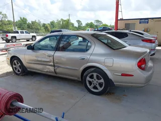 2001 Nissan Maxima GXE z VIN JN1CA31D61T622506, wystawiony jako IAAI lot #42344837 z przebiegiem 128 764 mil mil oraz . Historia ofert i sprzedaży dostępna na DreamBid. Obrazek 14.