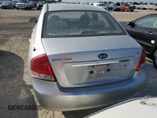 2009 Kia Spectra EX with VIN KNAFE221X95631249, listed as a Copart auction lot 75119304 with 193,338 mi miles and Salvage Title. Bid and sale history available at carsss.com. Image 6.