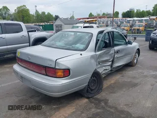 1993 Toyota Camry LE z VIN 4T1SK12E0PU290398, wystawiony jako IAAI lot #42032664 z przebiegiem 264 922 mil mil oraz . Historia ofert i sprzedaży dostępna na DreamBid. Obrazek 4.