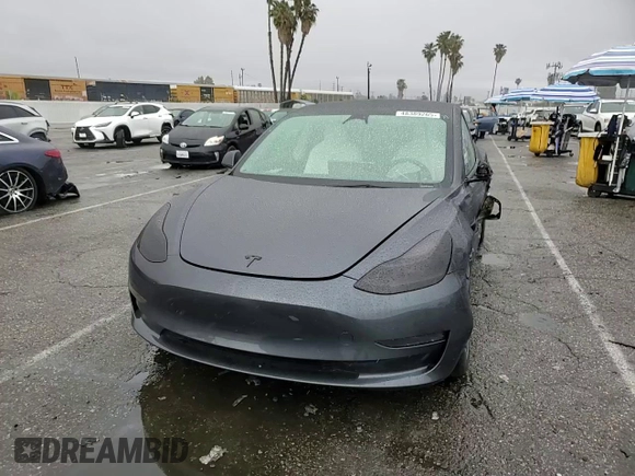 2023 Tesla Model 3 with VIN 5YJ3E1EA5PF640805, listed as a Copart auction lot 48389265 with 28,193 mi miles and Salvage title. Bid and sale history available at DreamBid. Image 11.