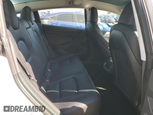 2023 Tesla Model 3 with VIN 5YJ3E1EA7PF450343, listed as a Copart auction lot 52446595 with 36,137 mi miles and Salvage Title. Bid and sale history available at DreamBid. Image 10.