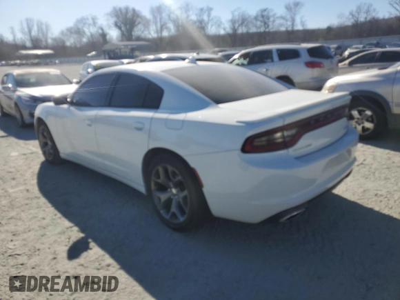 2015 Dodge Charger SXT with VIN 2C3CDXHG9FH915076, listed as a Copart auction lot 46792735 with 156,199 mi miles and Salvage Title. Bid and sale history available at DreamBid. Image 2.