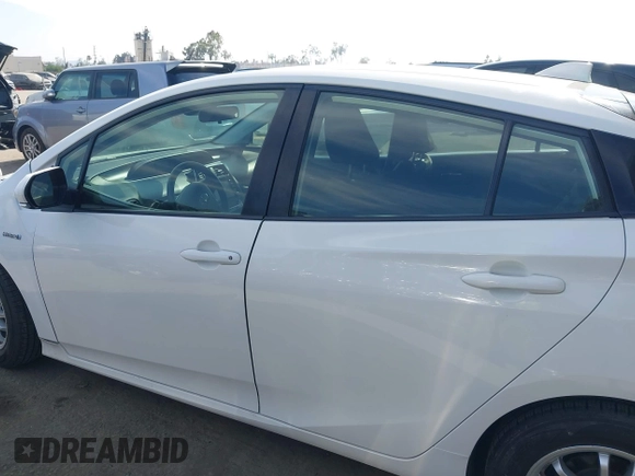 2022 Toyota Prius L Eco z VIN JTDKAMFU6N3177732, wystawiony jako IAAI lot #42504790 z przebiegiem 65 338 mil mil oraz . Historia ofert i sprzedaży dostępna na DreamBid. Obrazek 14.